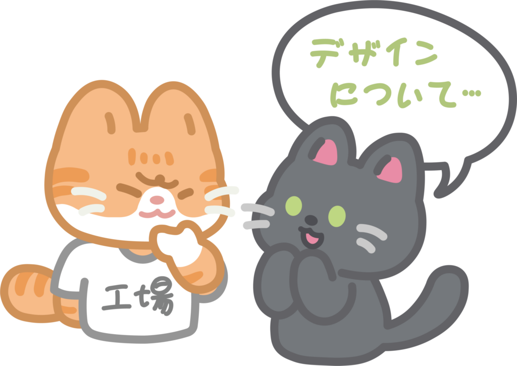 デザインについて相談している猫のイラスト